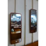 A pair of Danish teak framed mirrors