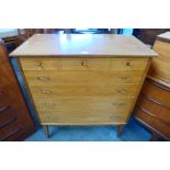 An Alfred Cox walnut chest of drawers