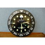 A Rolex dealer's display wall clock