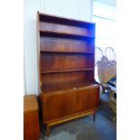 A Danish Bornholm teak bookcase, designed by Johannes Sorth