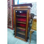 A Victorian mahogany wall mounted bookcase