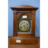 An early 20th Century beech mantel clock