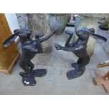 A pair of large bronze boxing hares