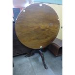 A George III mahogany circular tilt-top tripod tea table