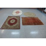 Three assorted rugs