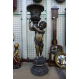 A large French style bronze figural cherub urn