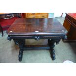 A 19th Century French carved oak green man single drawer writing table