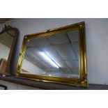 A gilt framed mirror