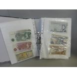 A folder containing a collection of bank notes, mainly British