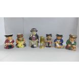 Six Toby jugs and a small brass miner's lamp