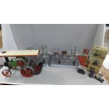 An early 1960's traction engine with instructions and accessories including a line shaft, model fan,