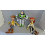 Three Toy Story 1 figures, Buzz Lightyear, Woody and Jessie