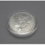 A U.S. Morgan silver 1883 dollar coin, New Orleans mint