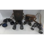 Four pairs of binoculars including one U.S. Military Bausch & Lomb, Rochester, New York