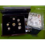 A collection of coins, sets and single bank notes, Royal Mint 2008 £5 coin Baby Gift Rattle, 50p