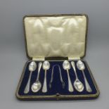 Six silver spoons and a pair of silver sugar bows, Sheffield 1937, 114g, bows not matching,