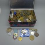 A collection of medallions, coins, etc.