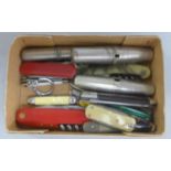 Fourteen penknives, two metamorphic corkscrews, etc., and a manicure set