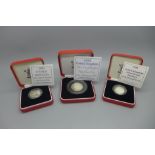 Three silver proof Piedfort coins, 50p 1998 and two £1 coins 1998 and 2000