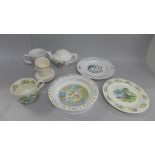 A collection of nursery china including Wade, a Wedgwood plate and Mothercare mug