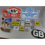 A collection of car badges, GB, AA, RAC, Caravan Club, cloth badges, Monte Carlo Rally, etc.