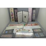 A Penny Black postage stamp in a folder, eight Royal Mail mint packs and one definitive
