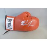 A signed Mike Tyson boxing glove