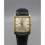 A Garrard 9ct gold cased gentleman's wristwatch, with inscription 'British Gypsum Ltd, F.O. Smith