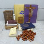 A collection of religious items including a crucifix, Bibles, rosary beads, etc. **PLEASE NOTE