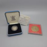 A 1995 UK silver proof one pound coin, The Royal Mint, boxed and a bronze Nottingham Castle Museum