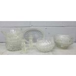 A collection of crystal bowls and a pair of candle holders **PLEASE NOTE THIS LOT IS NOT ELIGIBLE