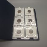 A complete set of George V farthings, 1911 to 1936 all in card holders and small pocket binder, (