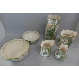 Six pieces of Mason's Applique china; a vase, three graduated jugs and two bowls