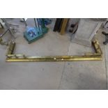 A Victorian country house brass fender