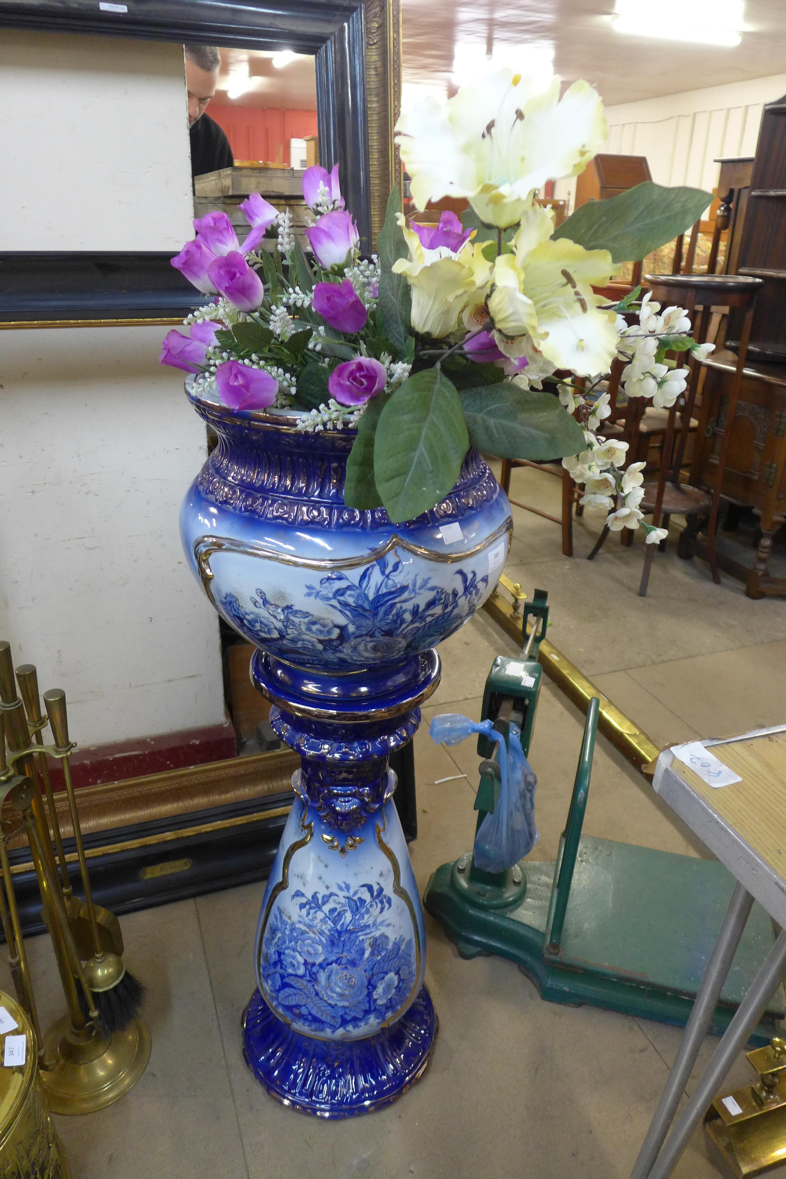 A Staffordshire flow blue porcelain jardiniere on stand