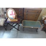 A mahogany folding tray, a mahogany and green leather top coffee table and a pine framed mirror