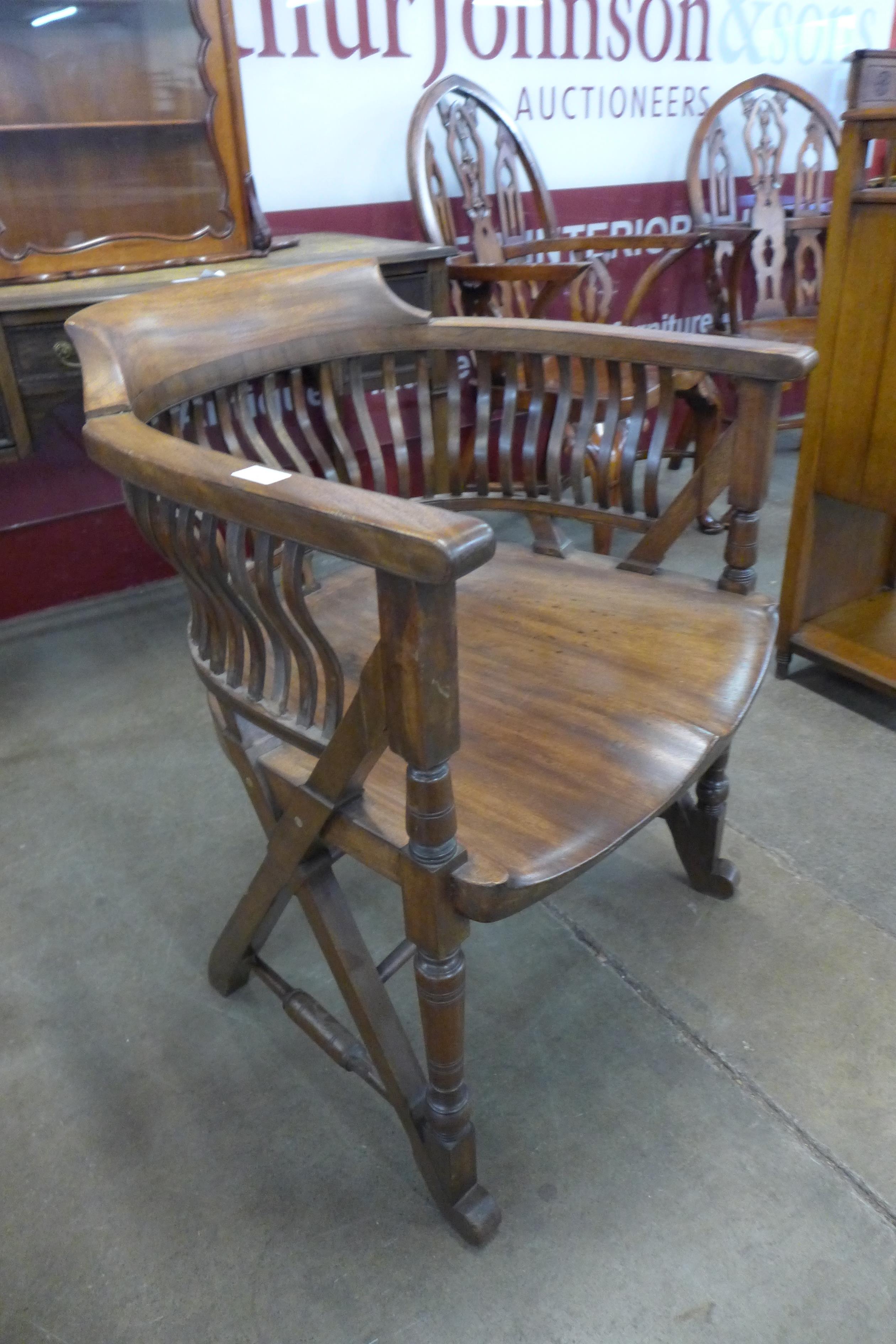 A Victorian mahogany Captain's desk chair