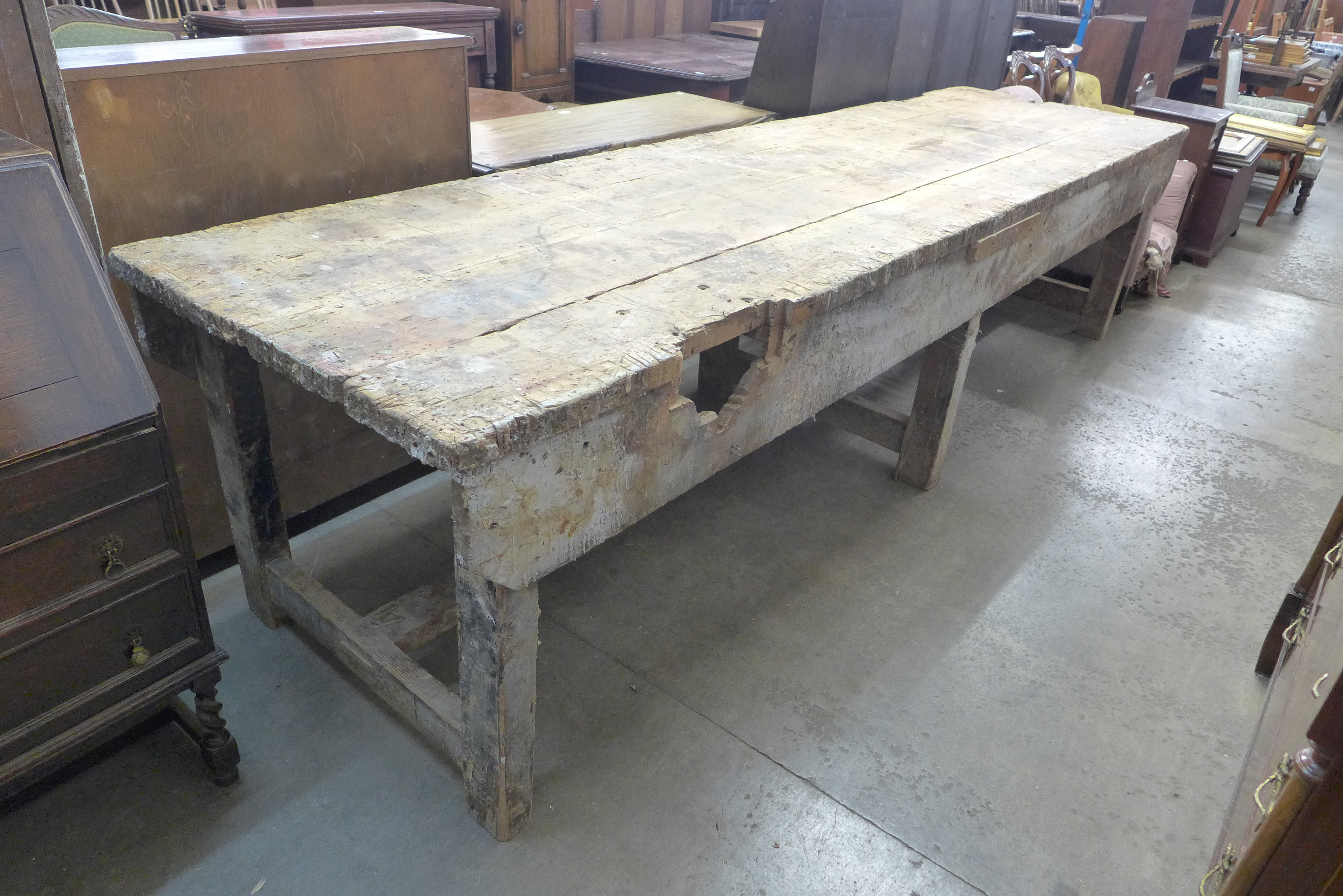 A large industrial pine work bench
