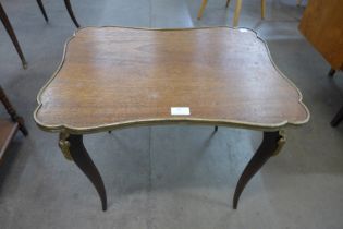A French Louis XV style mahogany and gilt mounted coffee table