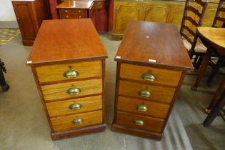 A pair of Victorian mahogany pedestal chests