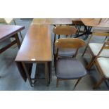 A teak drop-leaf table and two chairs