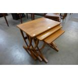 A Nathan teak nest of tables