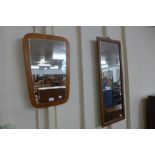 Two teak framed mirrors