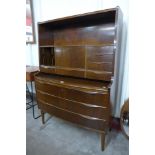 A Danish walnut bow front writing cabinet