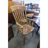 A Victorian elm and beech farmhouse armchair