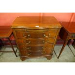 An mid-20th Century Chippendale Revival mahogany serpentine bachelor's chest of drawers