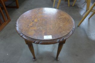A small Arts and Crafts oak occasional table
