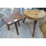 Two 19th Century primitive fruitwood milking stools