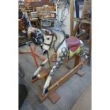 A vintage Leeway painted dapple grey rocking horse