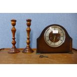 An Art Deco G&F Cope & Co. of Nottingham oak mantel clock and a pair of mahogany candlesticks